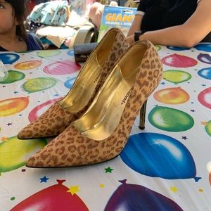 Shiny leopard heels